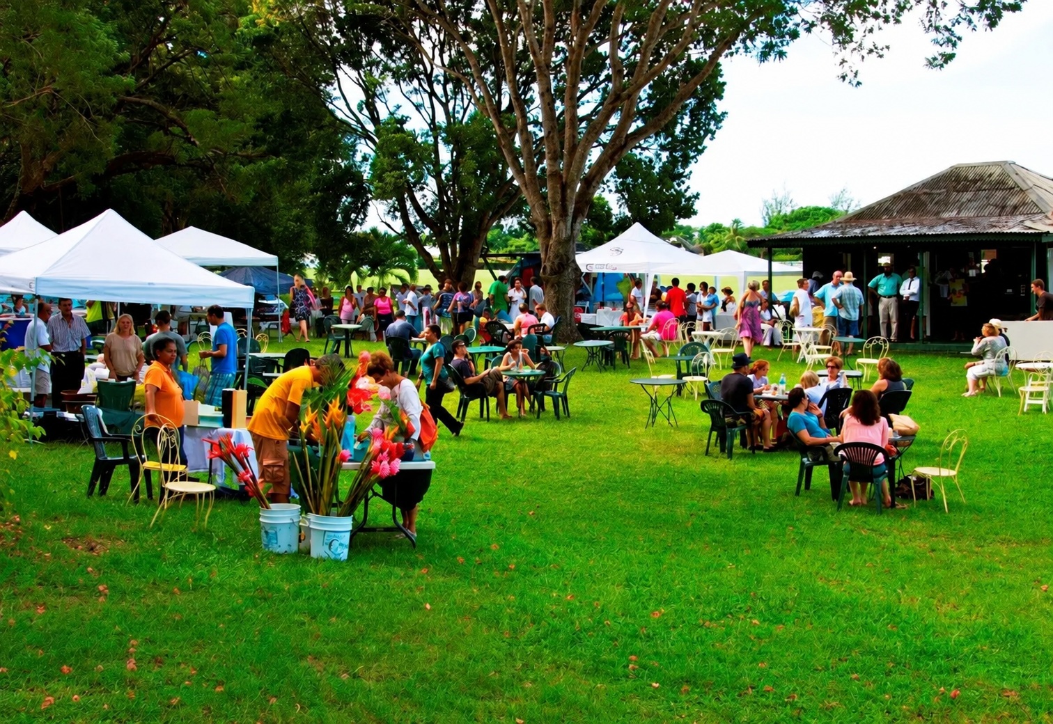 Visitors and market stalls in the gardens at Holders Farmers Market